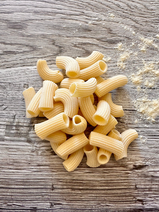 Rigatoni. "Stone-Milled Artisan Fresh Pasta."