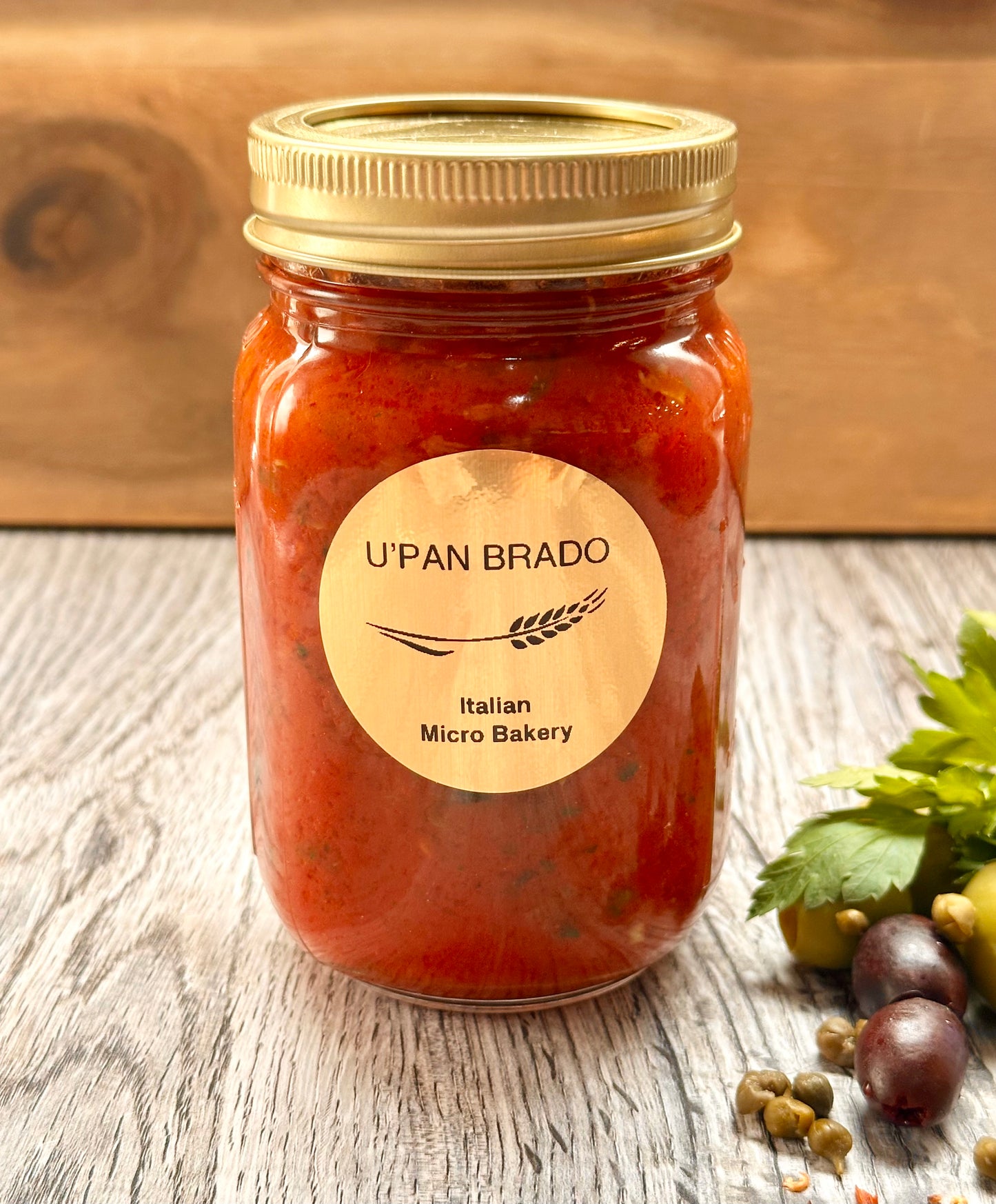 "U'PAN BRADO" Puttanesca Sauce with Olives, Capers and Salted Anchovies.