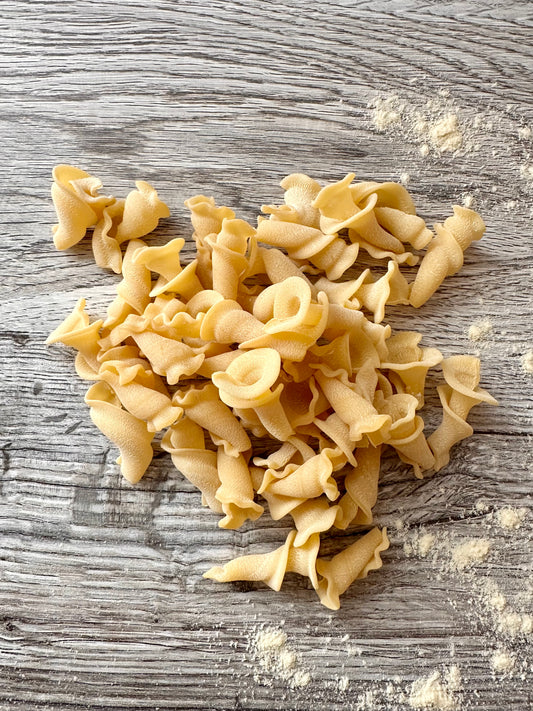 Campanelle. "Stone-Milled Artisan Fresh Pasta."